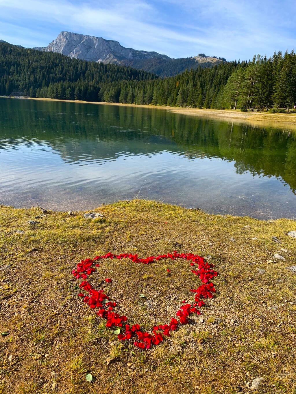 Black Lake, Zabljak, Durmitor with heart in rose petals
